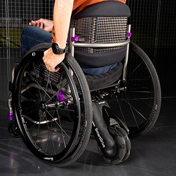 Manual Wheelchair Power Assist Systems