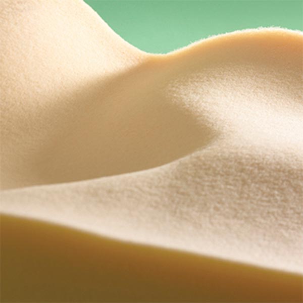 The soft foam base of the Ride Designs Forward Wheelchair Cushion